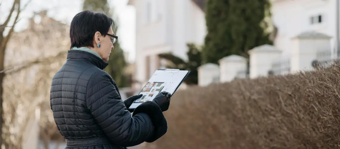 Professional property valuer conducting an Adelaide property assessment