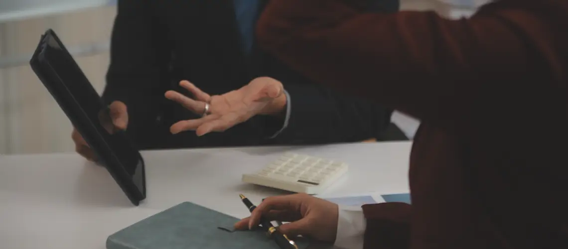 Professional conducting a business valuation in Sydney office